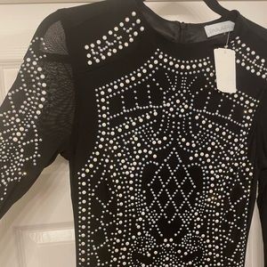 NWT mesh and jeweled long sleeve mini dress.